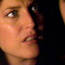 Scully lurched out of Dzeh�s embrace and turned to glower at him.